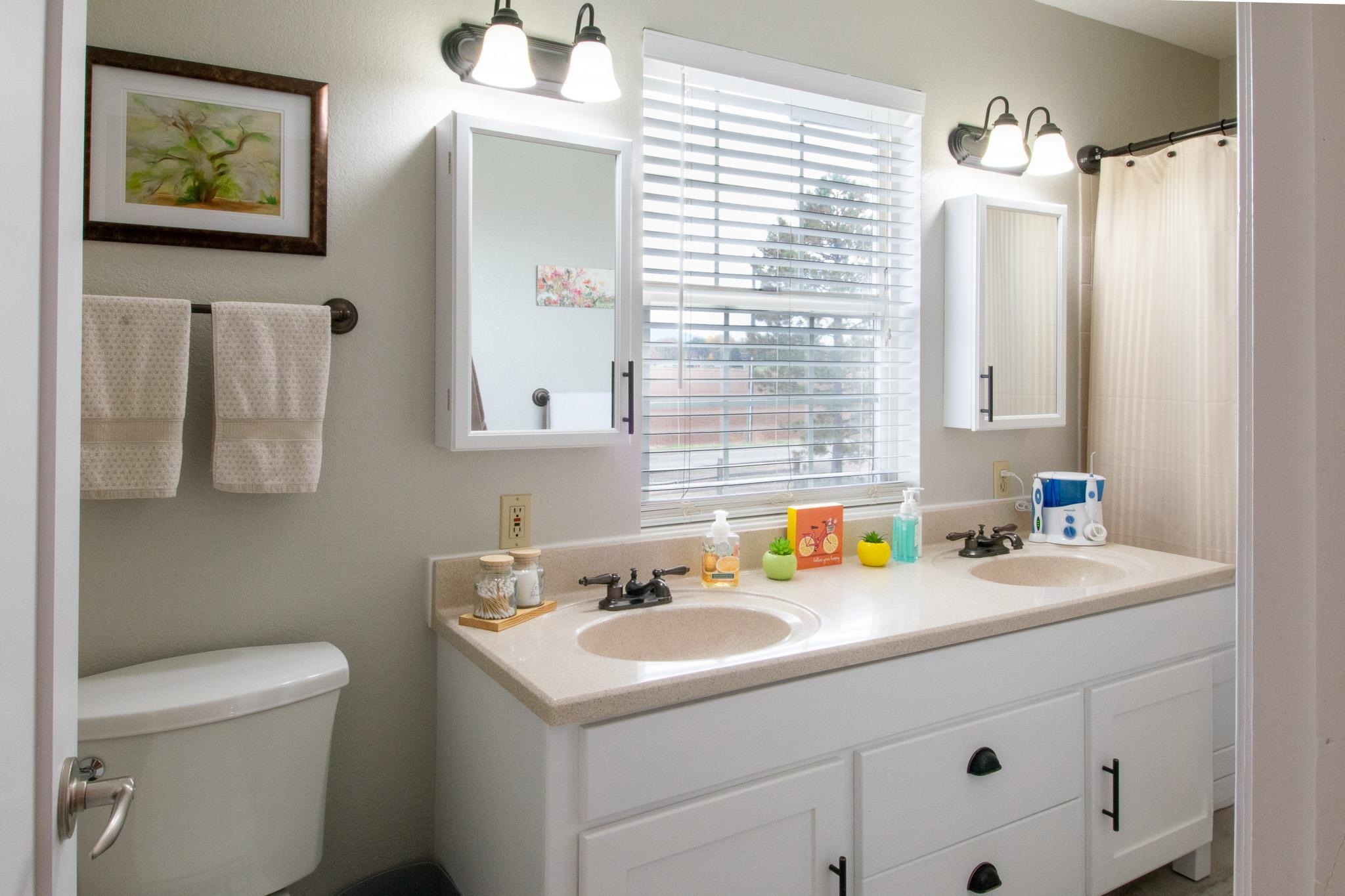 273 30 Road Grand Junction, CO 81503 - Photo 23 of 42 a bathroom with a sink double vanity and a toilet