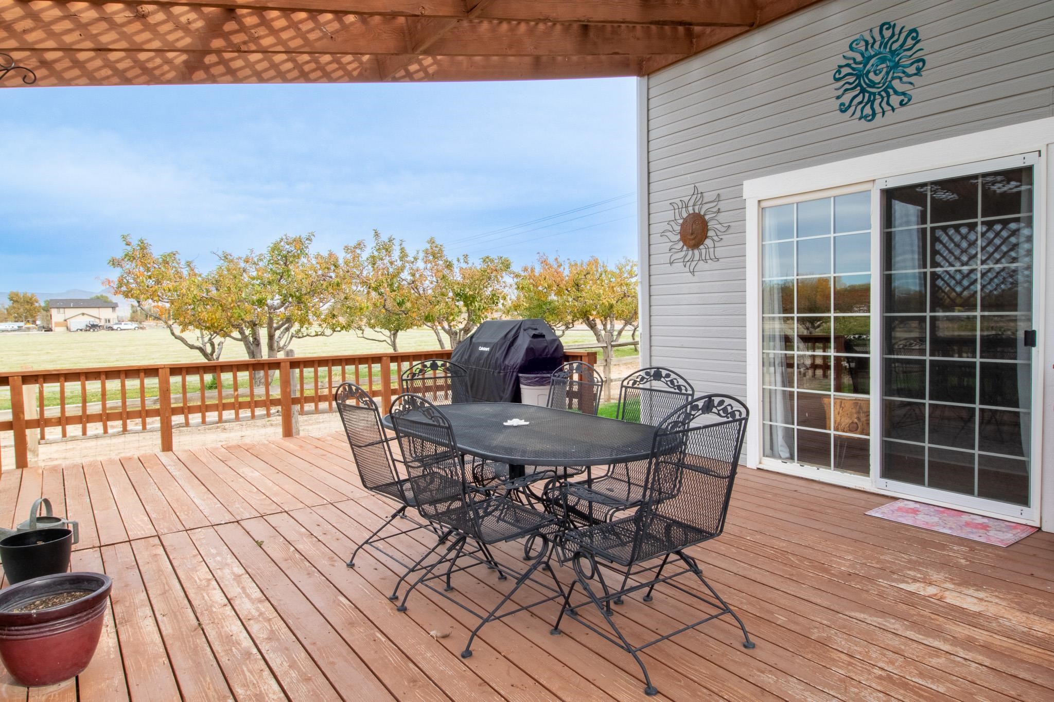 273 30 Road Grand Junction, CO 81503 - Photo 29 of 42 a view of a balcony with table and chairs