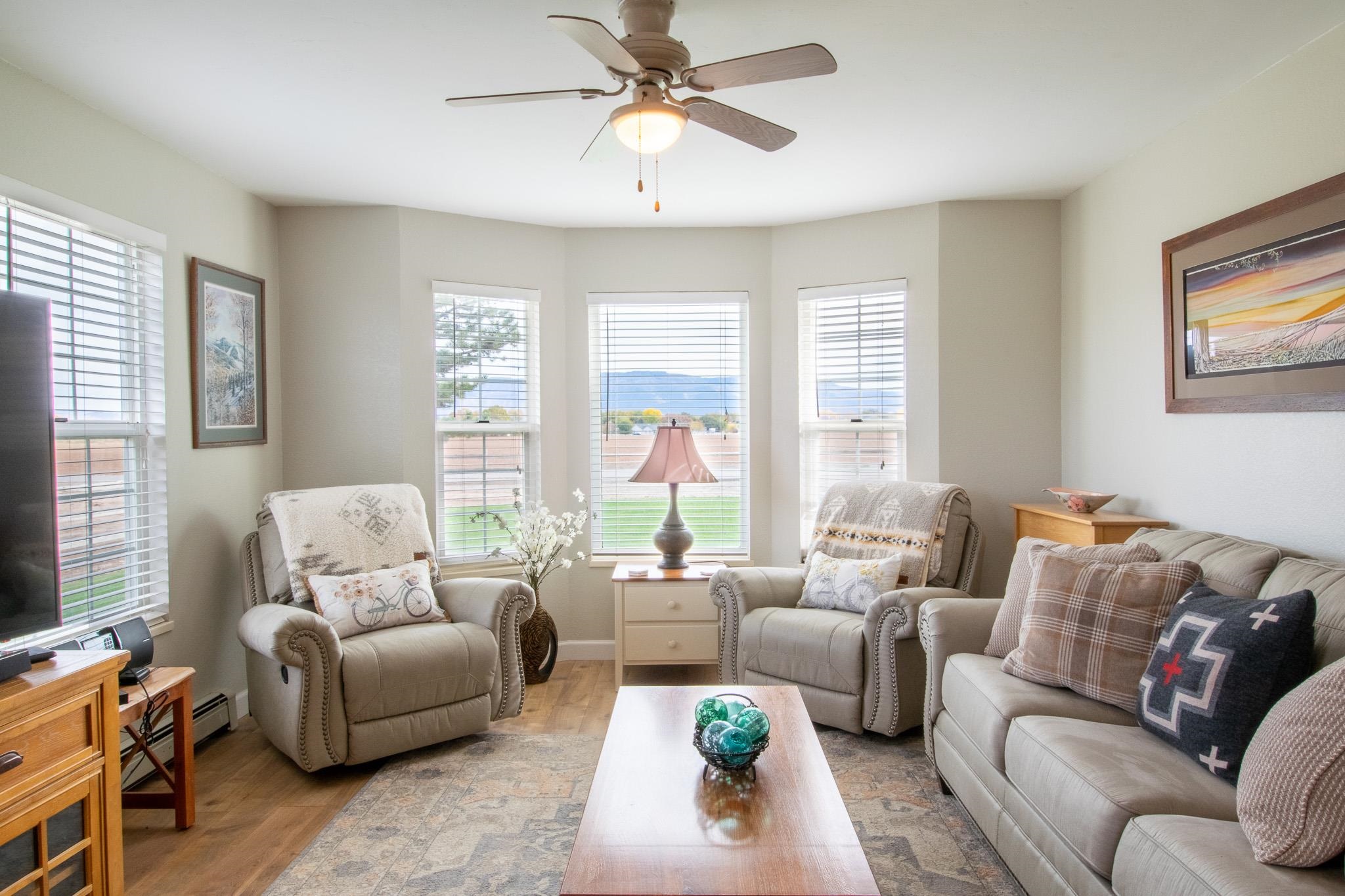 273 30 Road Grand Junction, CO 81503 - Photo 5 of 42 a living room with furniture and a large window