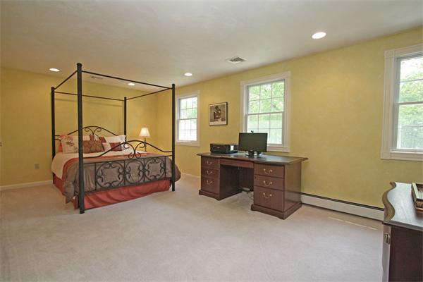 157 Kaleva Road Lancaster, MA 01523 - Photo 17 of 26 a bedroom with a bed and window