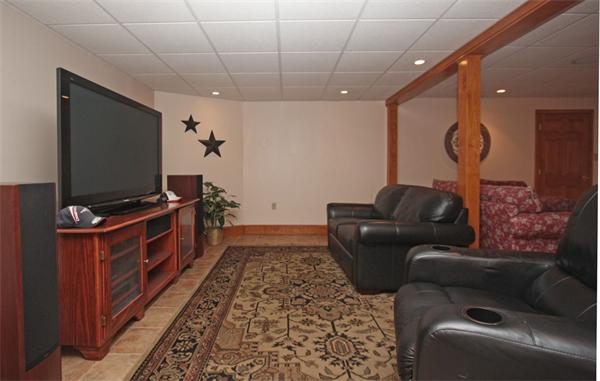 157 Kaleva Road Lancaster, MA 01523 - Photo 21 of 26 a living room with furniture and a flat screen tv