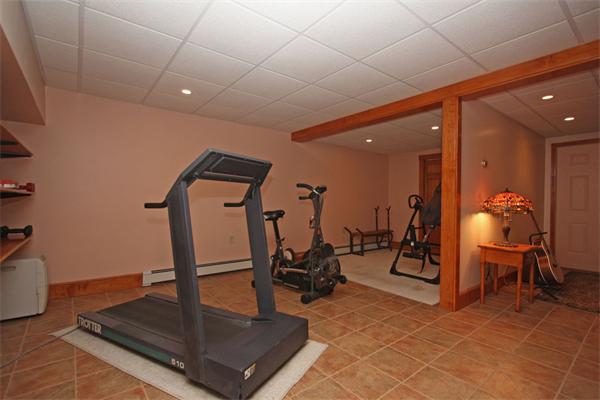 157 Kaleva Road Lancaster, MA 01523 - Photo 22 of 26 a view of a room with gym equipment