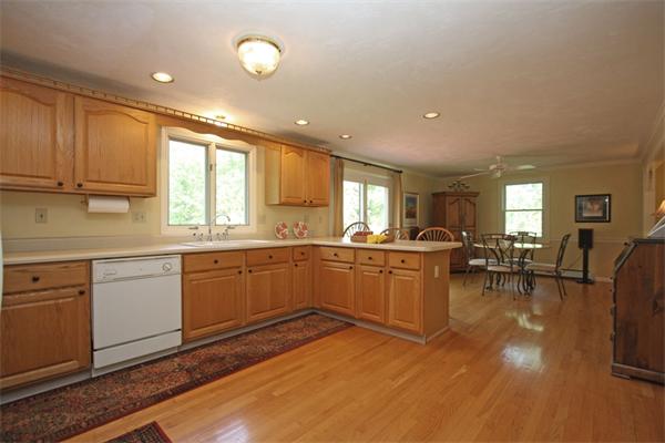 157 Kaleva Road Lancaster, MA 01523 - Photo 8 of 26 a kitchen with sink refrigerator and cabinets