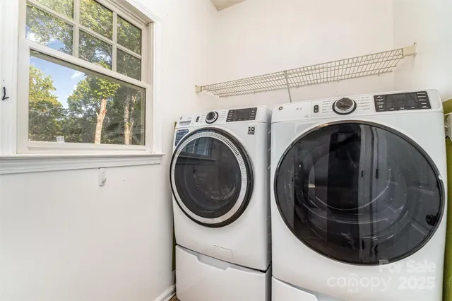 a utility room with dryer and washer