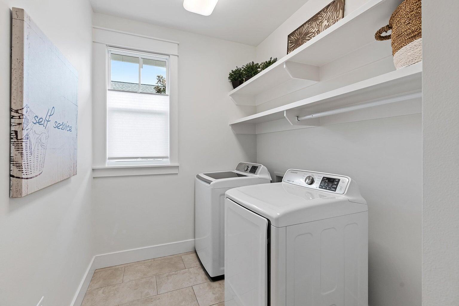 51 Sandchase Circle Watersound, FL 32461 - Photo 24 of 24 a utility room with dryer and washer