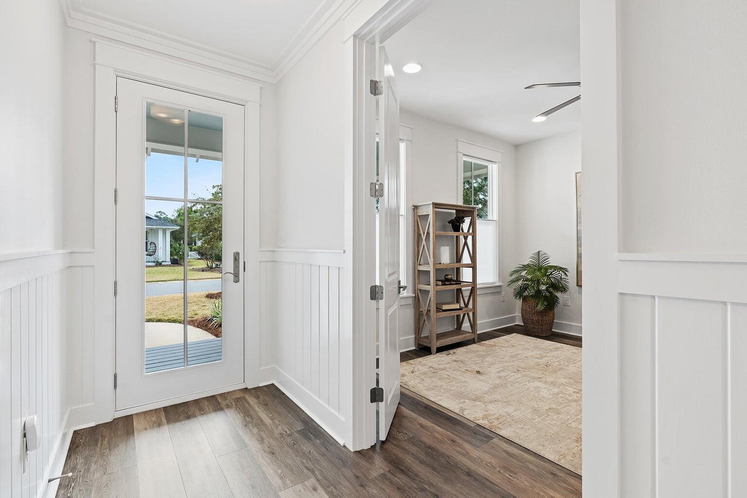 51 Sandchase Circle Watersound, FL 32461 - Photo 4 of 24 a view of livingroom with furniture and wooden floor