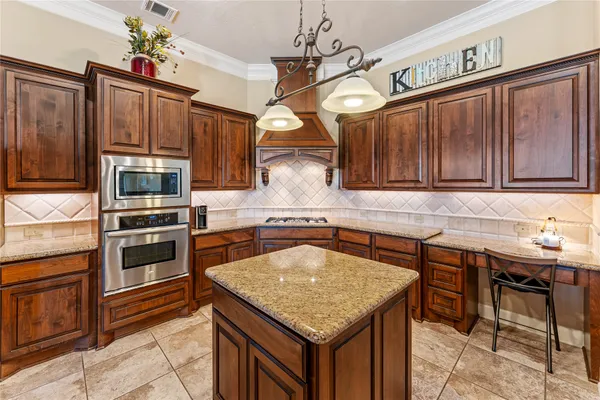 a bathroom with a bathtub shower sink and cabinets