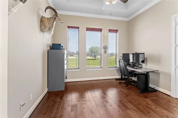 a view of a swimming pool and a yard