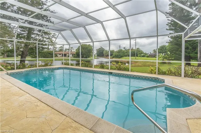 a view of outdoor space with swimming pool