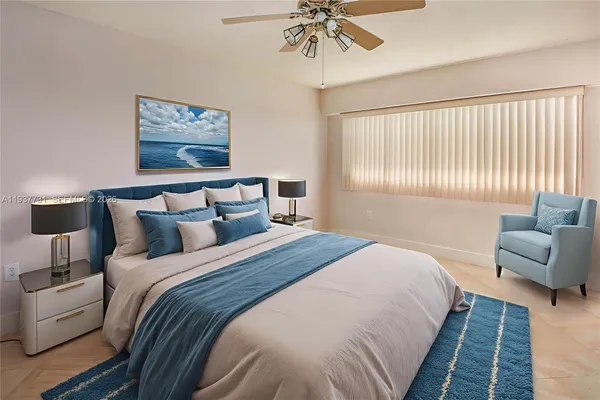 a bedroom with bed and a couch