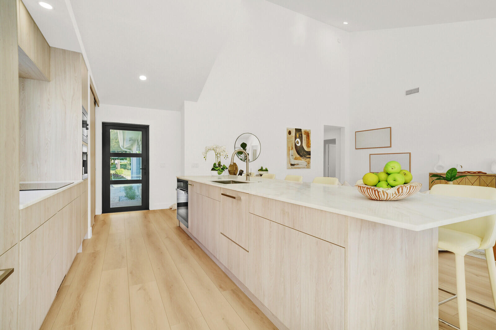418 River Edge Road Jupiter, FL 33477 - Photo 13 of 44 a hallway with a white cabinets