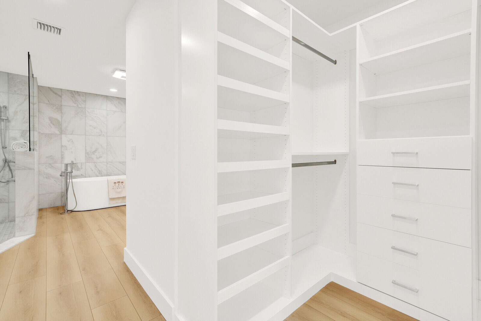 418 River Edge Road Jupiter, FL 33477 - Photo 22 of 44 a view of a walk in closet