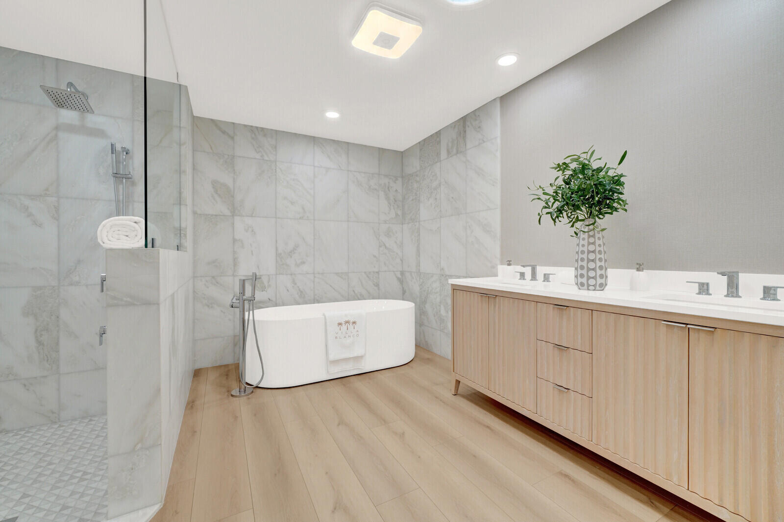 418 River Edge Road Jupiter, FL 33477 - Photo 23 of 44 a bathroom with a double vanity sink and mirror