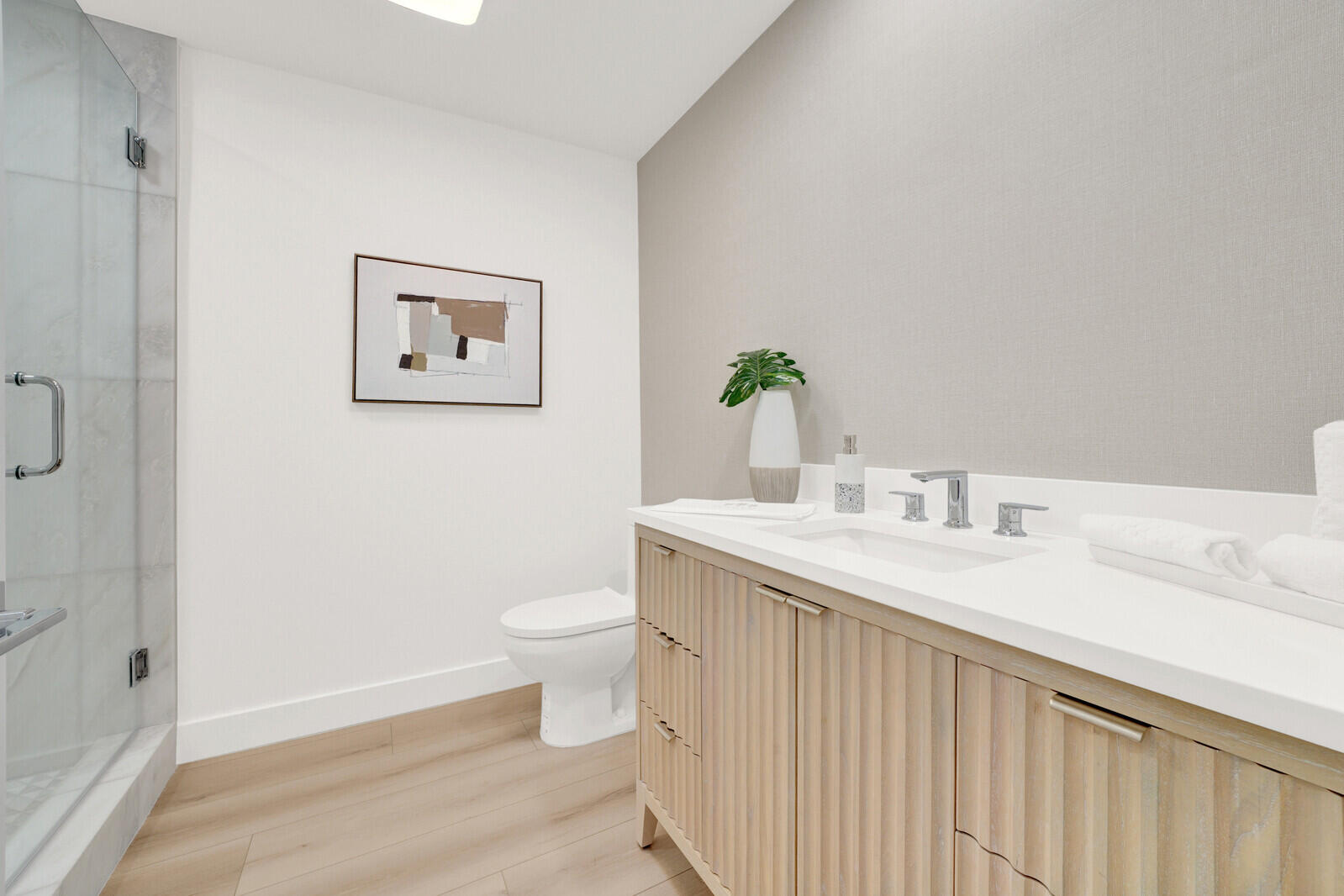 418 River Edge Road Jupiter, FL 33477 - Photo 29 of 44 a bathroom with a granite countertop sink a toilet and a mirror