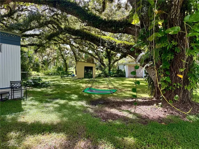 a view of a backyard with a garden