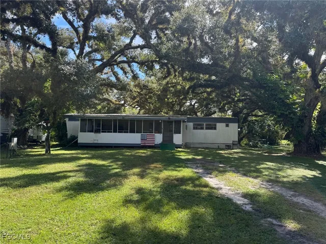 a view of a back yard of the house