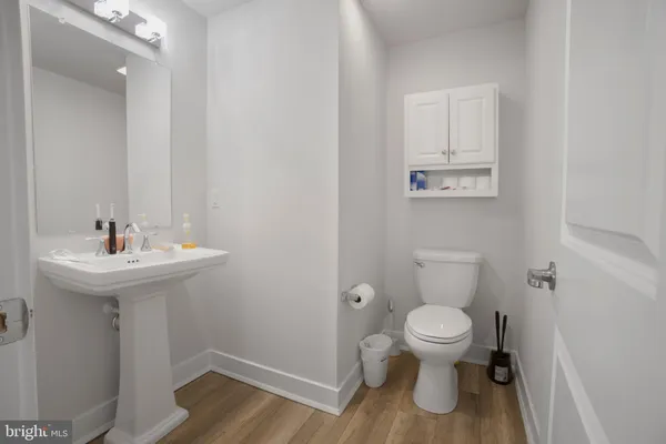 a bathroom with a sink and mirror