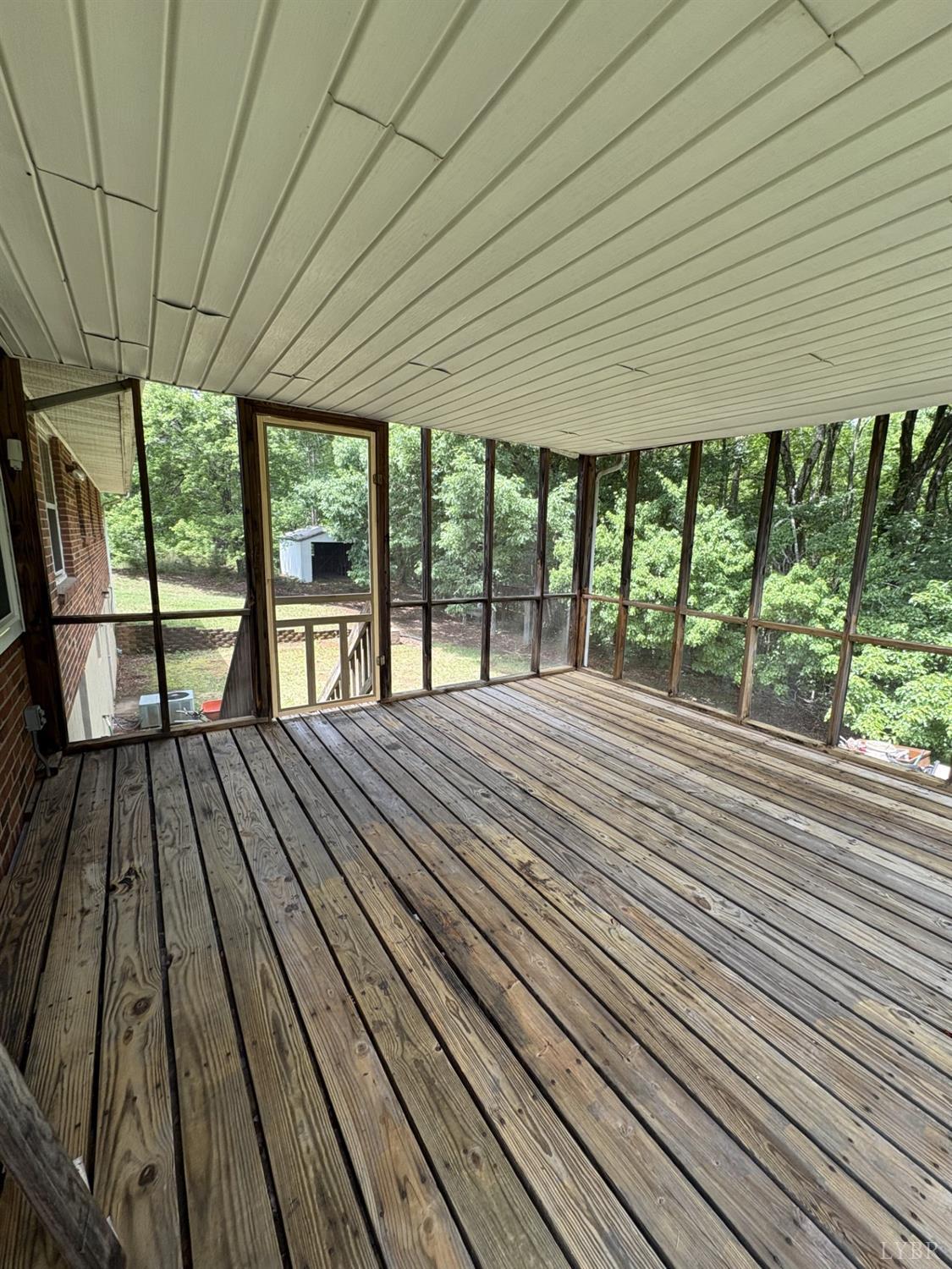 1796 Owens Mill Road Gretna, VA 24557 - Photo 9 of 20 wooden floor on roof deck