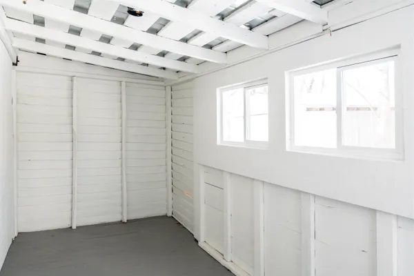 an empty room with windows