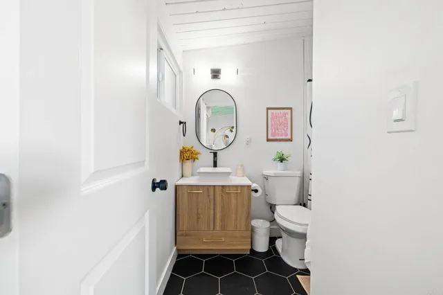 a large white bed in a white room