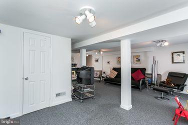 3418 Manor Hill Road Baltimore, MD 21208 - Photo 15 of 19 Lower Level Family Room