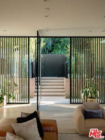 a view of a living room and window