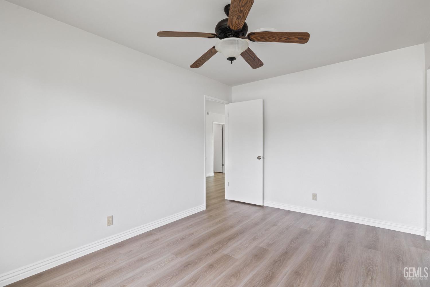 Undisclosed Address Bakersfield, CA 93306 - Photo 13 of 46 wooden floor in an empty room
