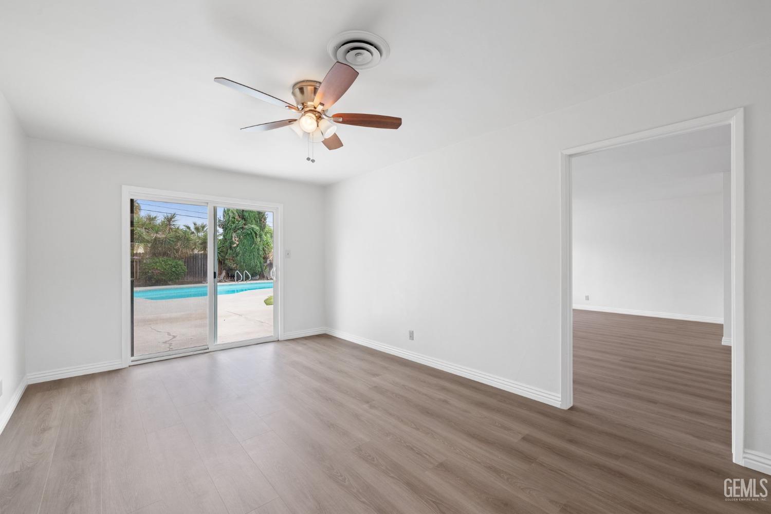 Undisclosed Address Bakersfield, CA 93306 - Photo 22 of 46 a view of an empty room with a window