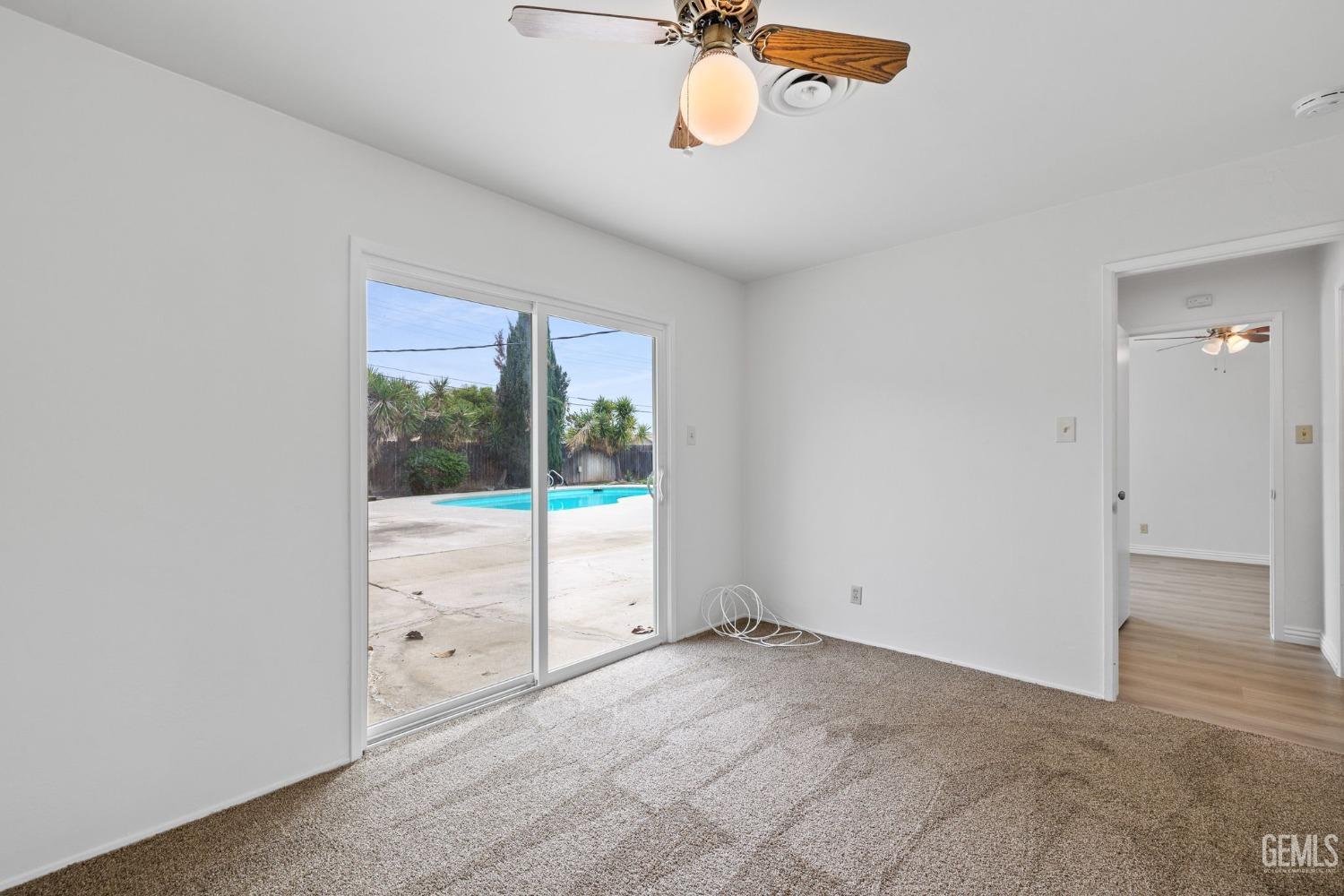 Undisclosed Address Bakersfield, CA 93306 - Photo 26 of 46 an empty room with a window