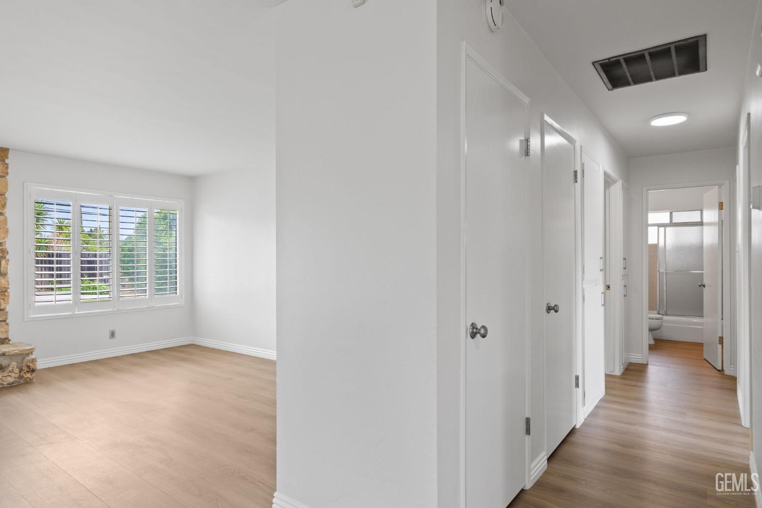 Undisclosed Address Bakersfield, CA 93306 - Photo 28 of 46 a view of an empty room with a gallery