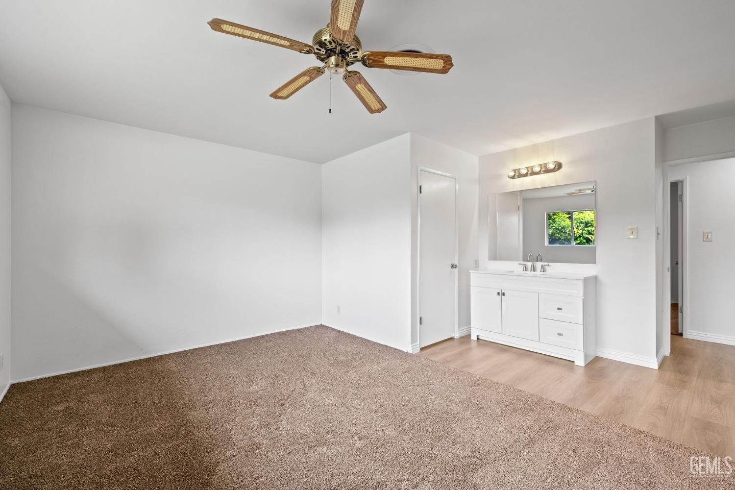 Undisclosed Address Bakersfield, CA 93306 - Photo 31 of 46 an empty room with closet and windows