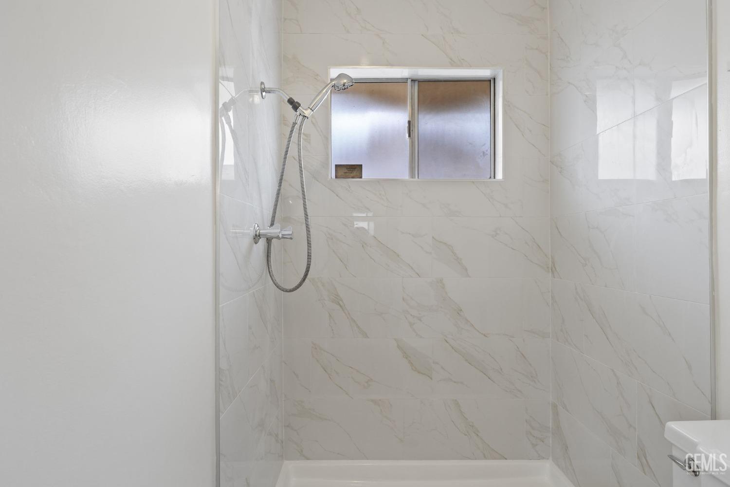 Undisclosed Address Bakersfield, CA 93306 - Photo 33 of 46 a bathroom with a shower