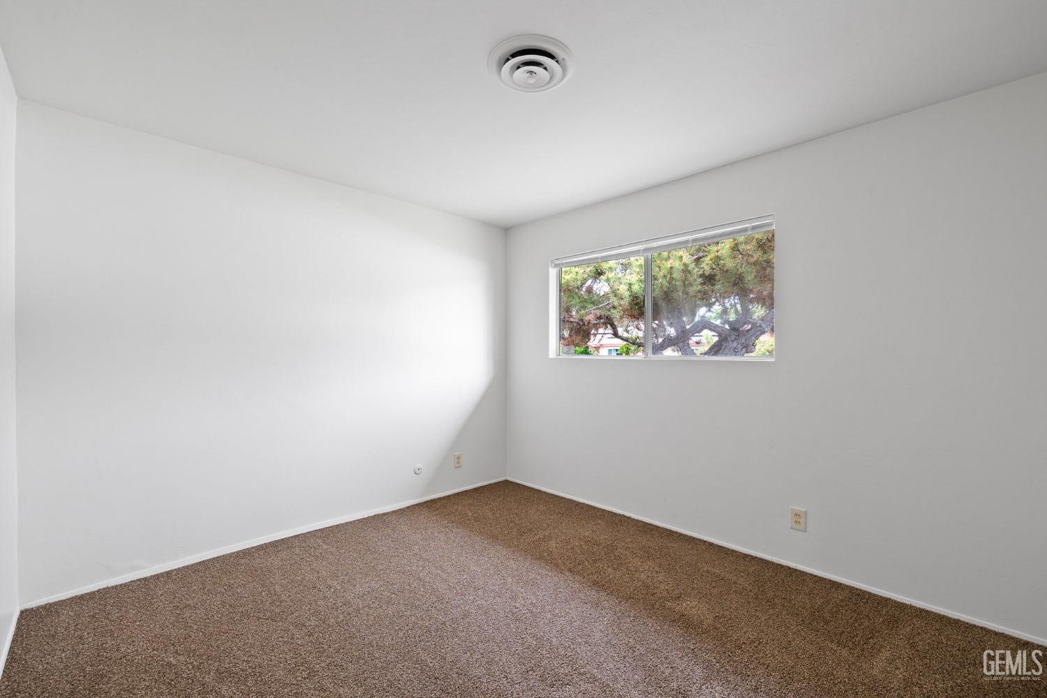 Undisclosed Address Bakersfield, CA 93306 - Photo 34 of 46 an empty room with windows