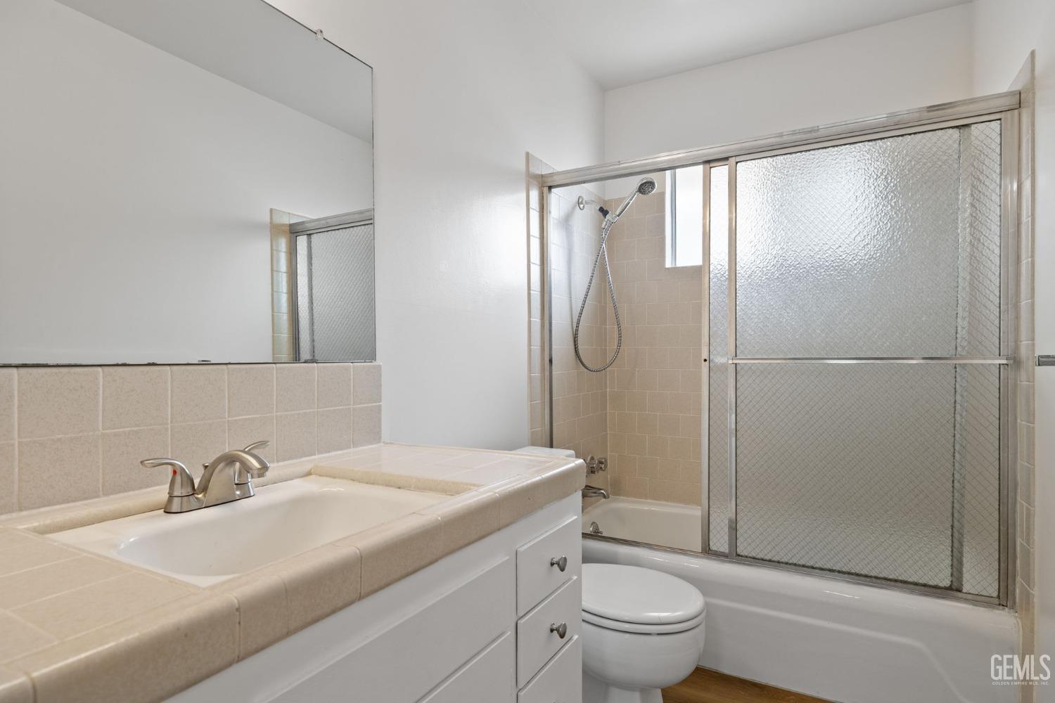 Undisclosed Address Bakersfield, CA 93306 - Photo 36 of 46 a bathroom with a sink toilet and shower