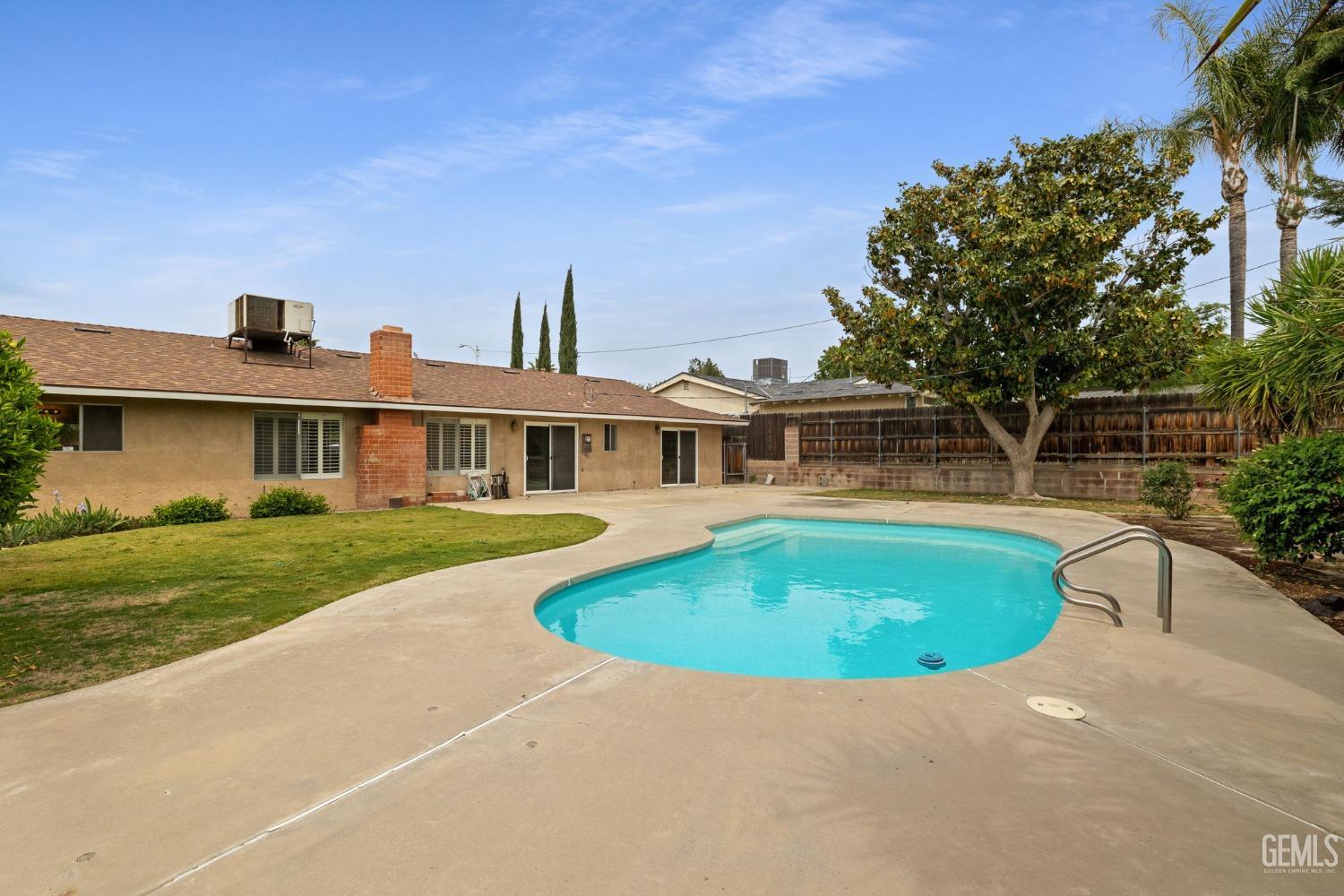 Undisclosed Address Bakersfield, CA 93306 - Photo 42 of 46 a front view of house with outdoor space and yard
