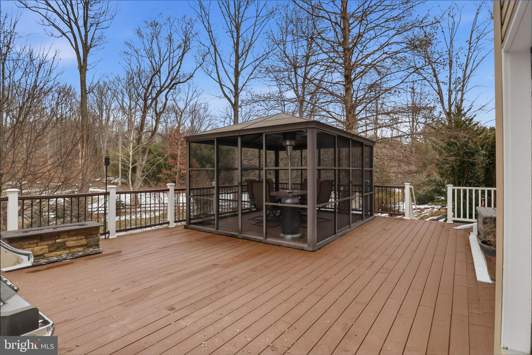 7501 Clifton Road Clifton, VA 20124 - Photo 54 of 93 a view of a wooden deck with trees