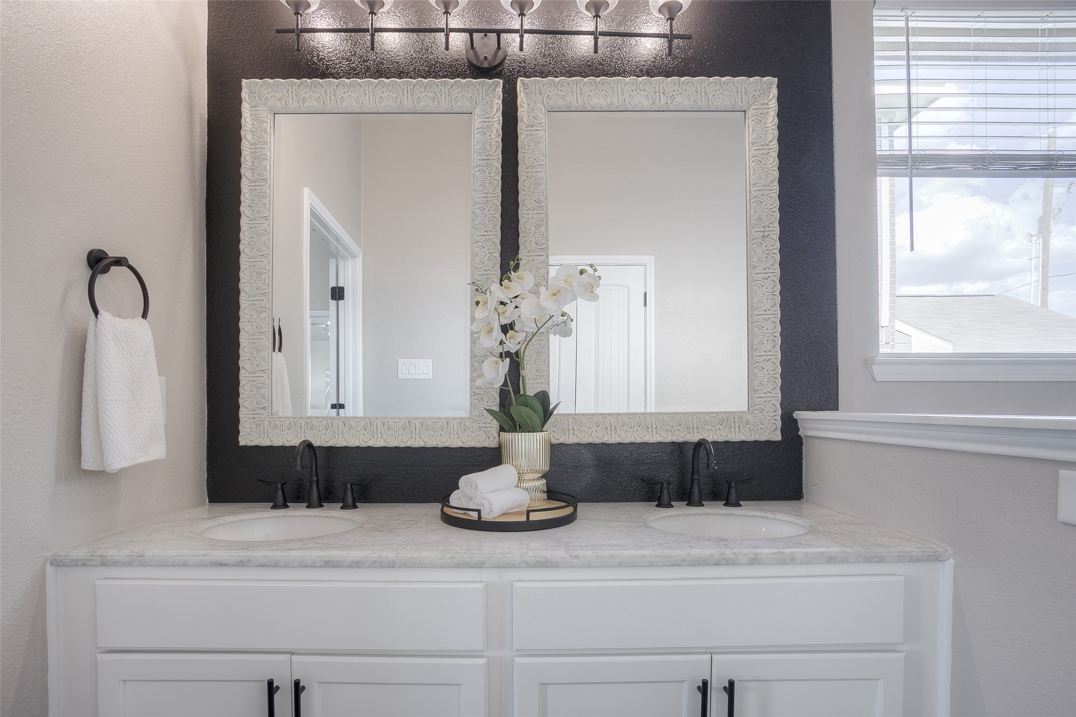 14519 Weir Creek Road Willis, TX 77318 - Photo 21 of 38 a bathroom with a sink and a mirror