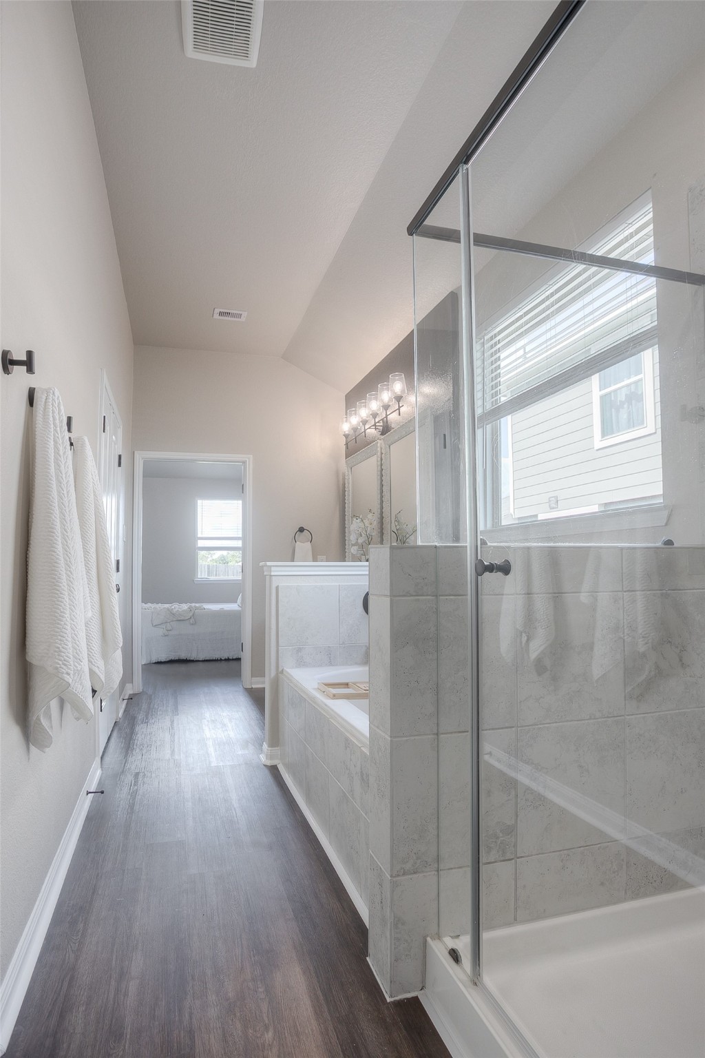 14519 Weir Creek Road Willis, TX 77318 - Photo 24 of 38 a bathroom with a bathtub and a shower