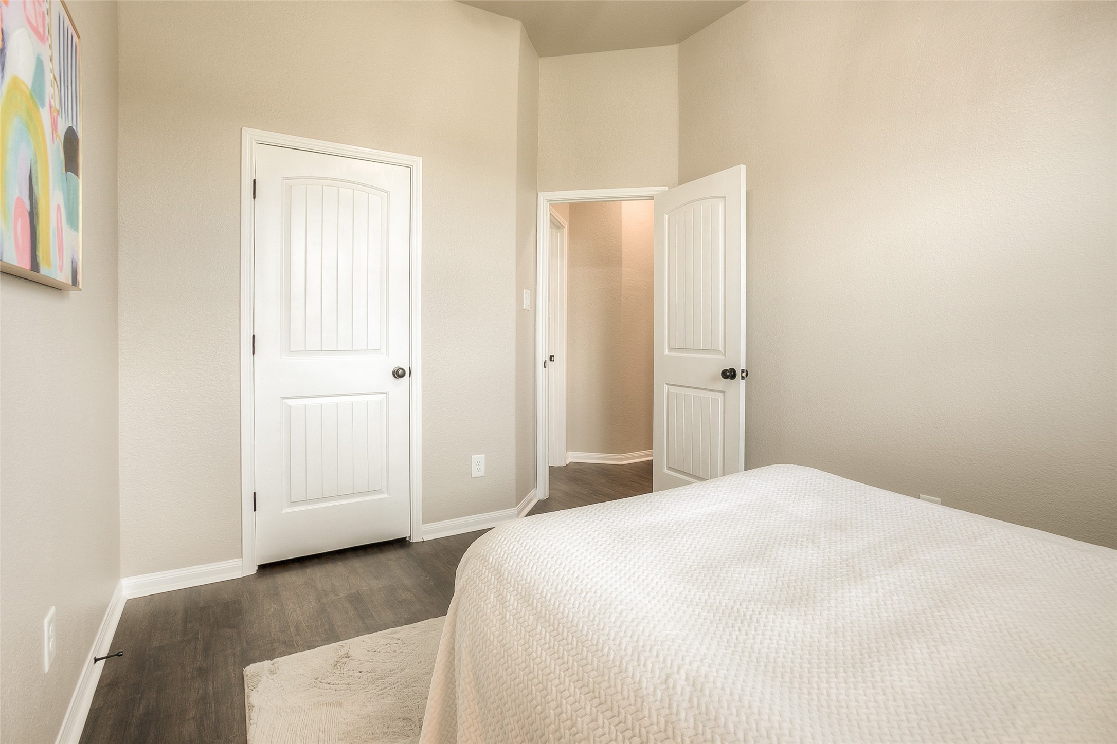 14519 Weir Creek Road Willis, TX 77318 - Photo 28 of 38 a bedroom with a bed and white cabinet