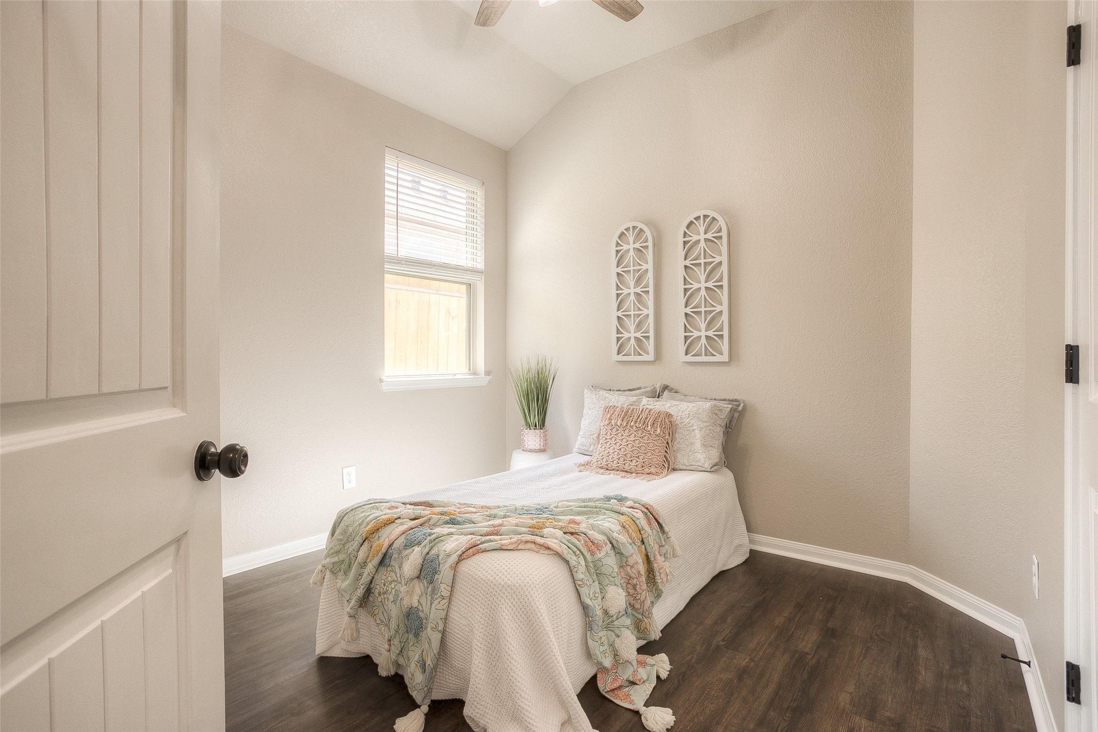 14519 Weir Creek Road Willis, TX 77318 - Photo 31 of 38 a bedroom with a bed and a window