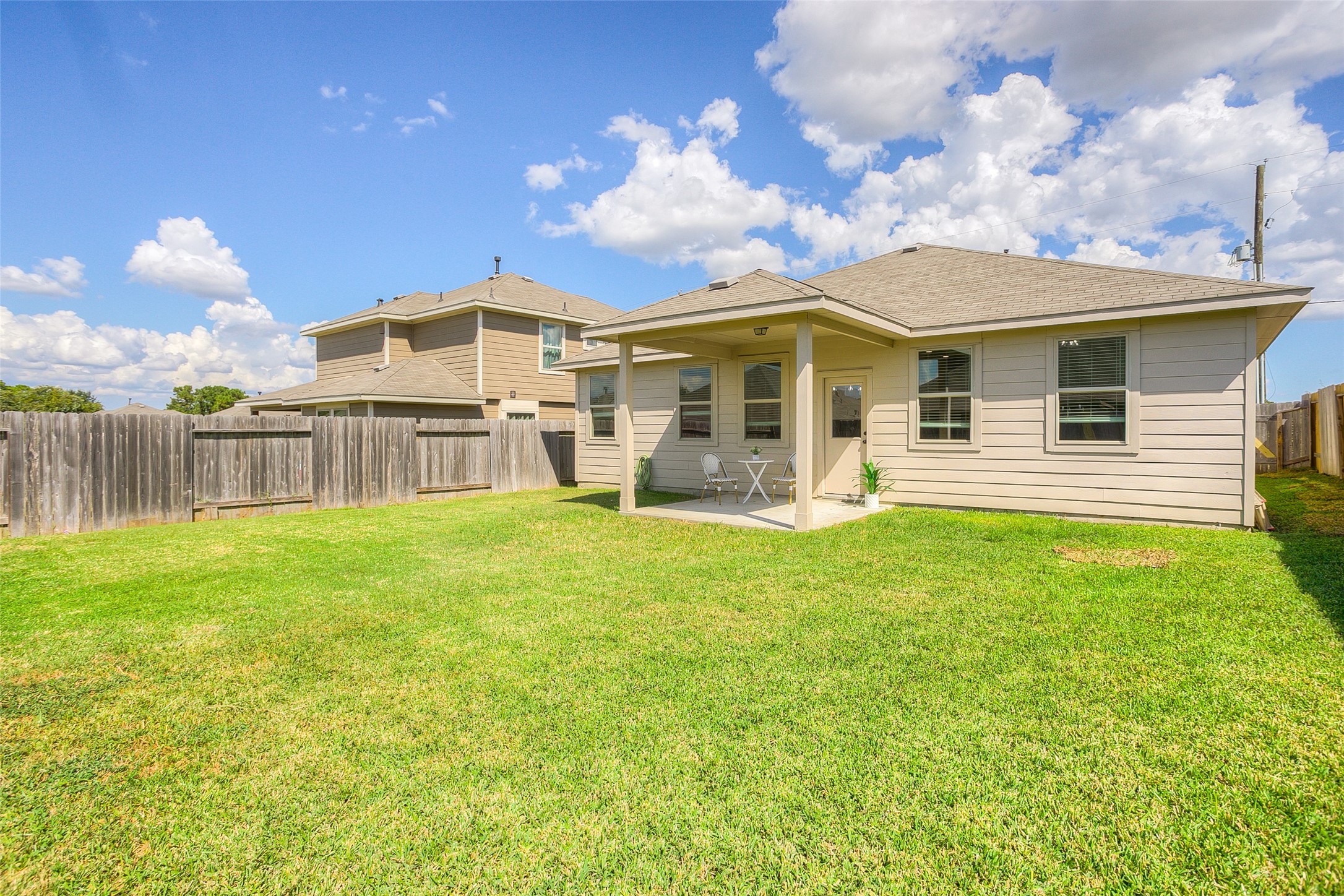 14519 Weir Creek Road Willis, TX 77318 - Photo 33 of 38 a view of a house with a backyard