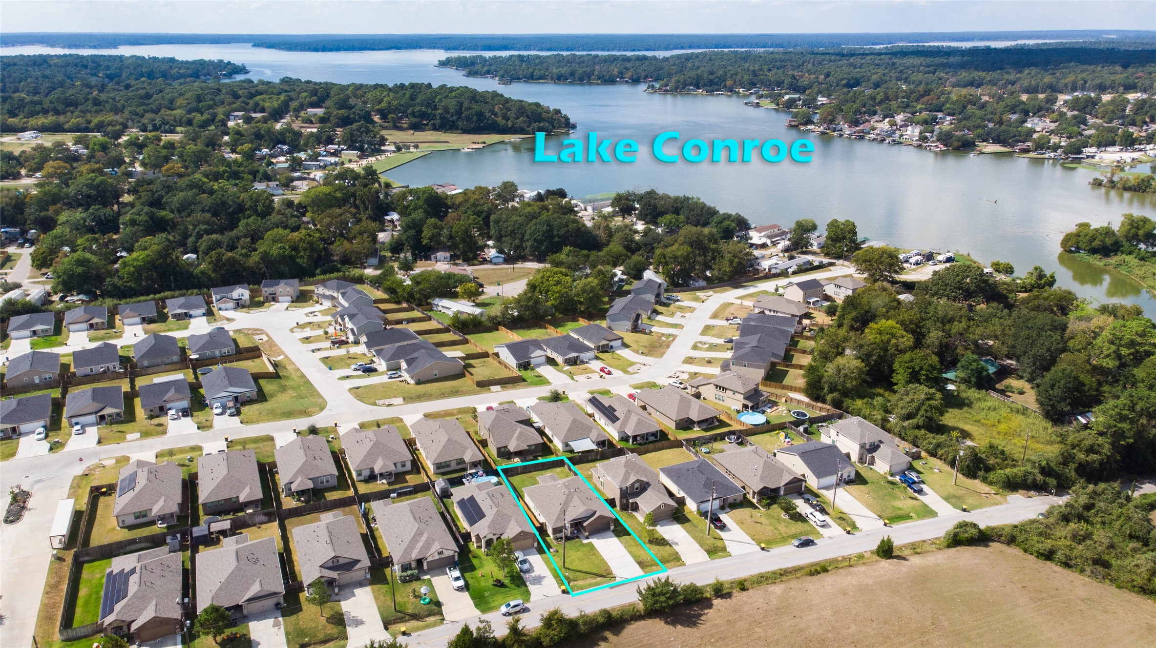 14519 Weir Creek Road Willis, TX 77318 - Photo 36 of 38 an aerial view of multiple house