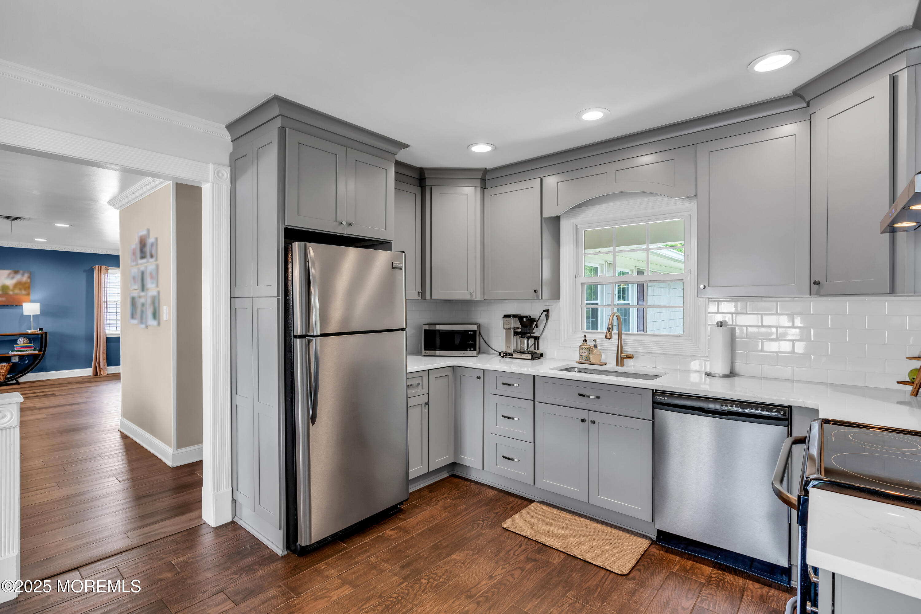 511 Line Road Aberdeen, NJ 07747 - Photo 17 of 53 a kitchen with a sink stainless steel appliances and cabinets
