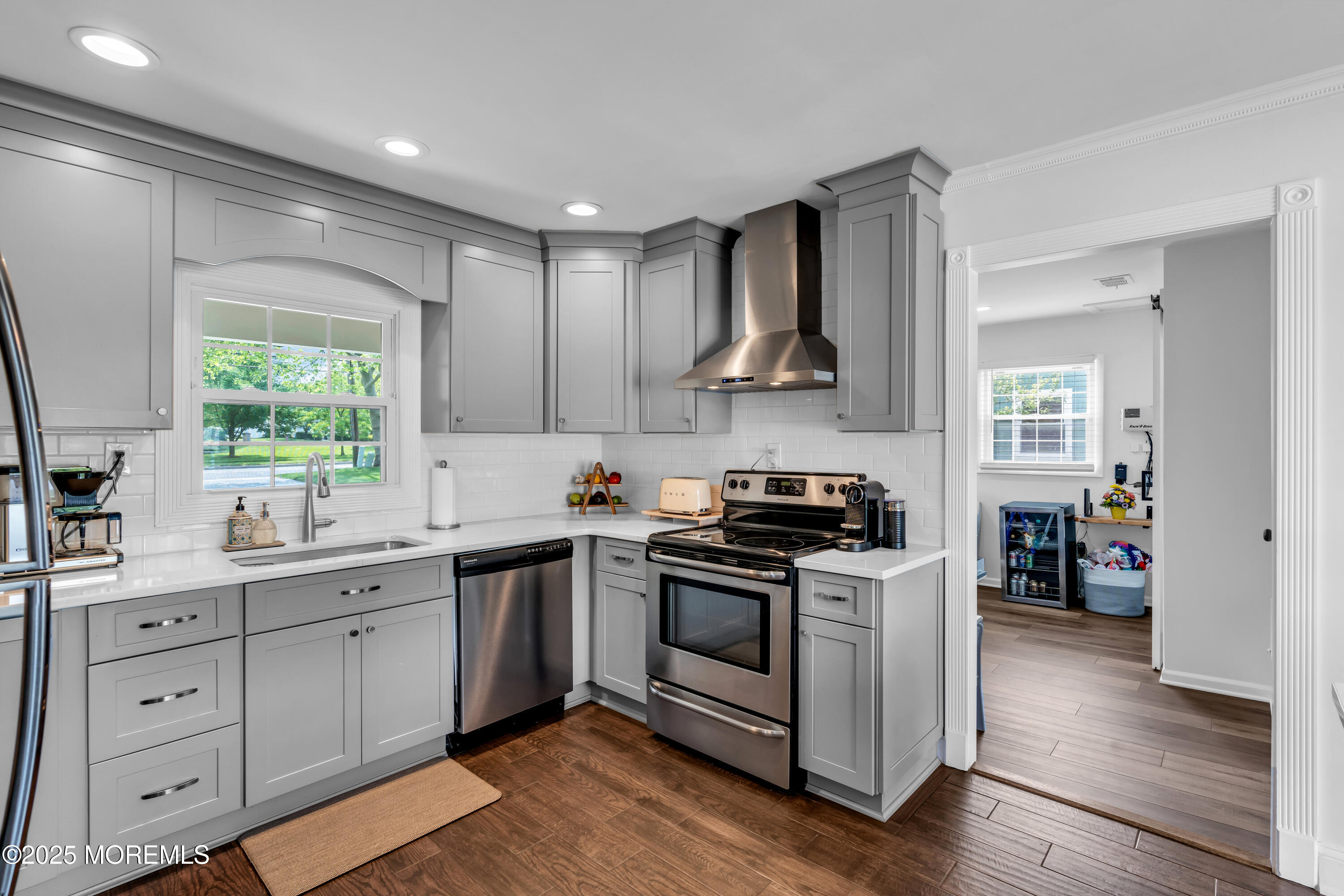 511 Line Road Aberdeen, NJ 07747 - Photo 19 of 53 a kitchen with stainless steel appliances a stove sink and cabinets