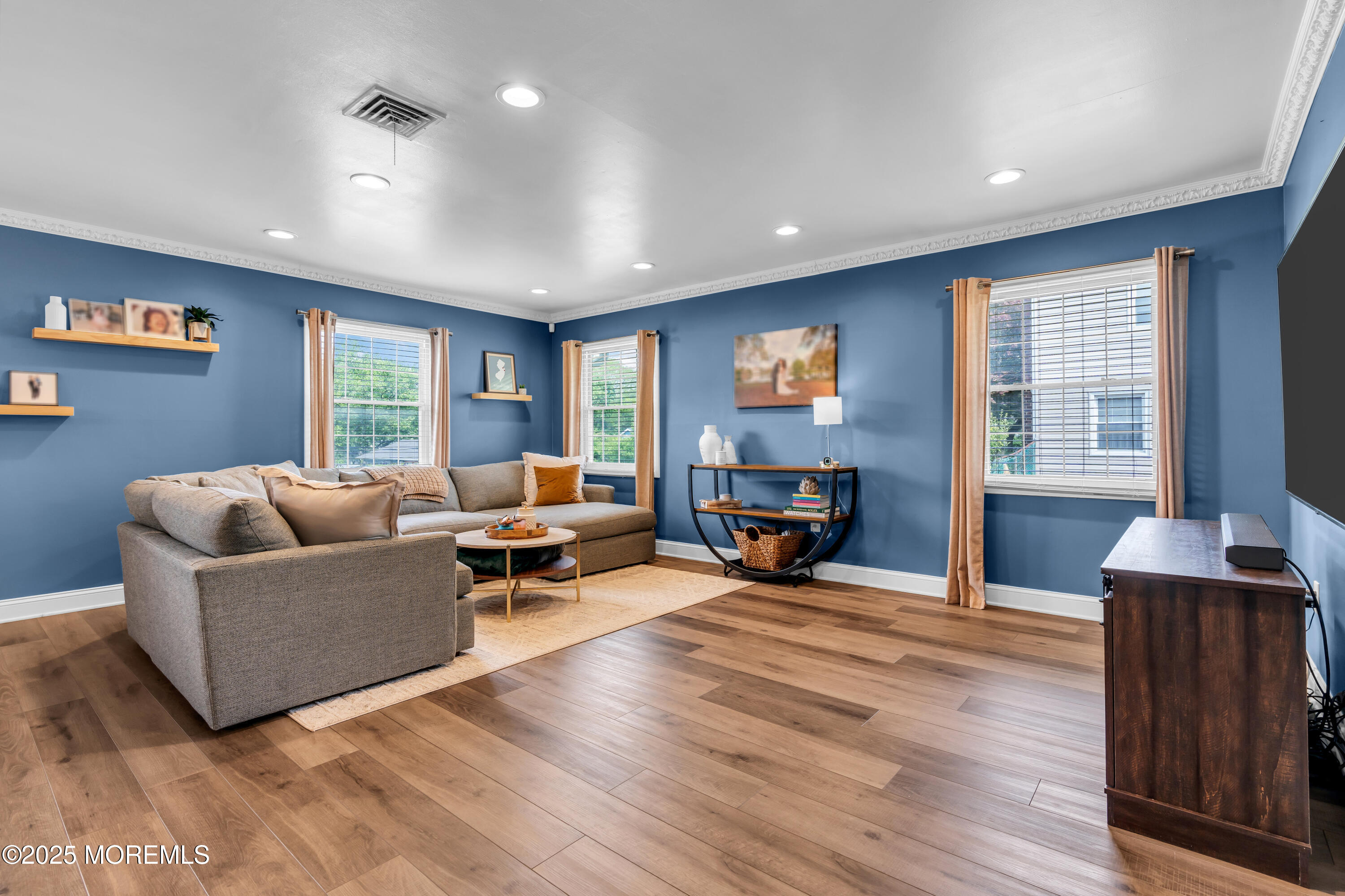 511 Line Road Aberdeen, NJ 07747 - Photo 26 of 53 a living room with furniture and a fireplace