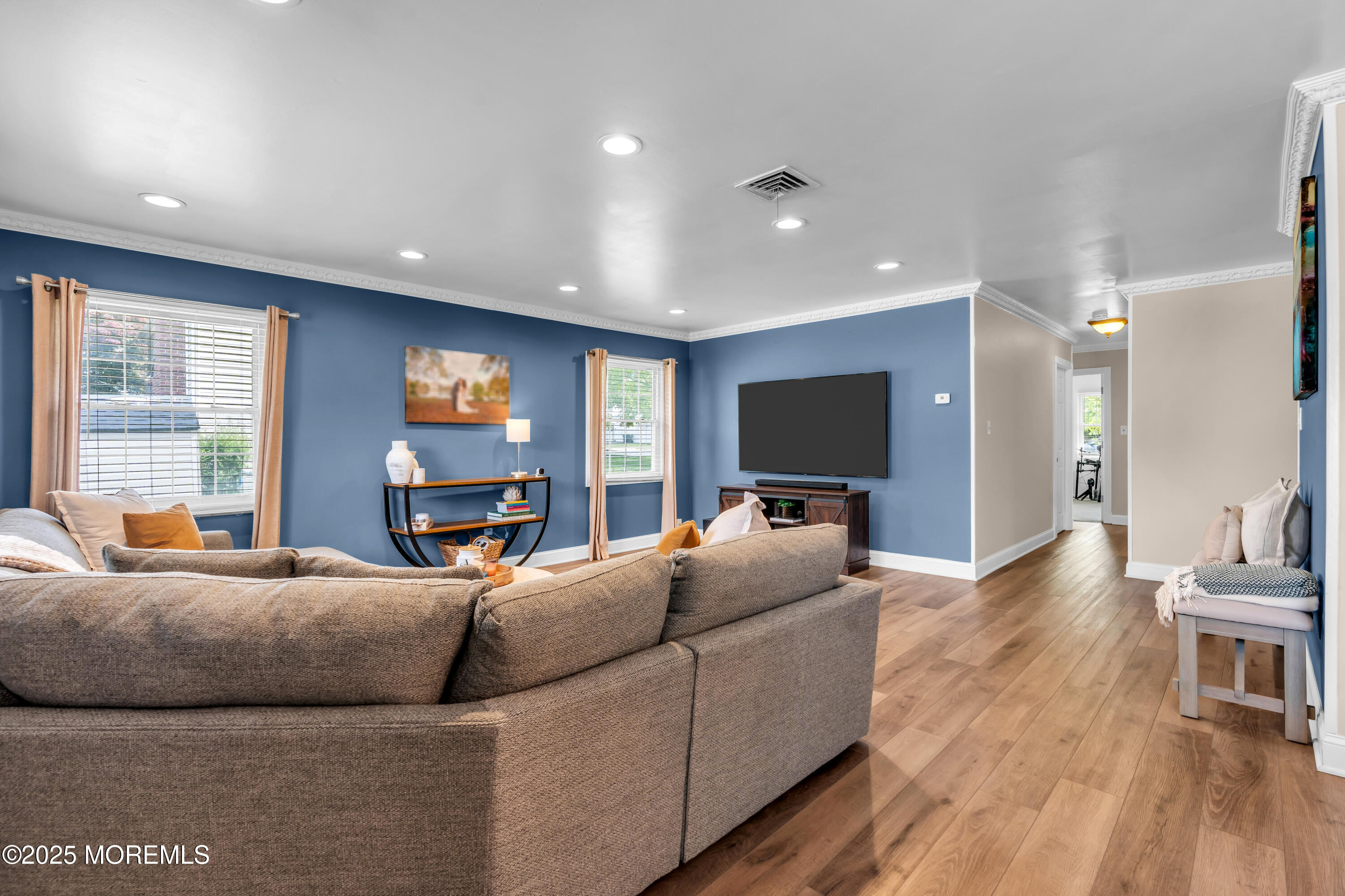 511 Line Road Aberdeen, NJ 07747 - Photo 28 of 53 a living room with furniture and a flat screen tv