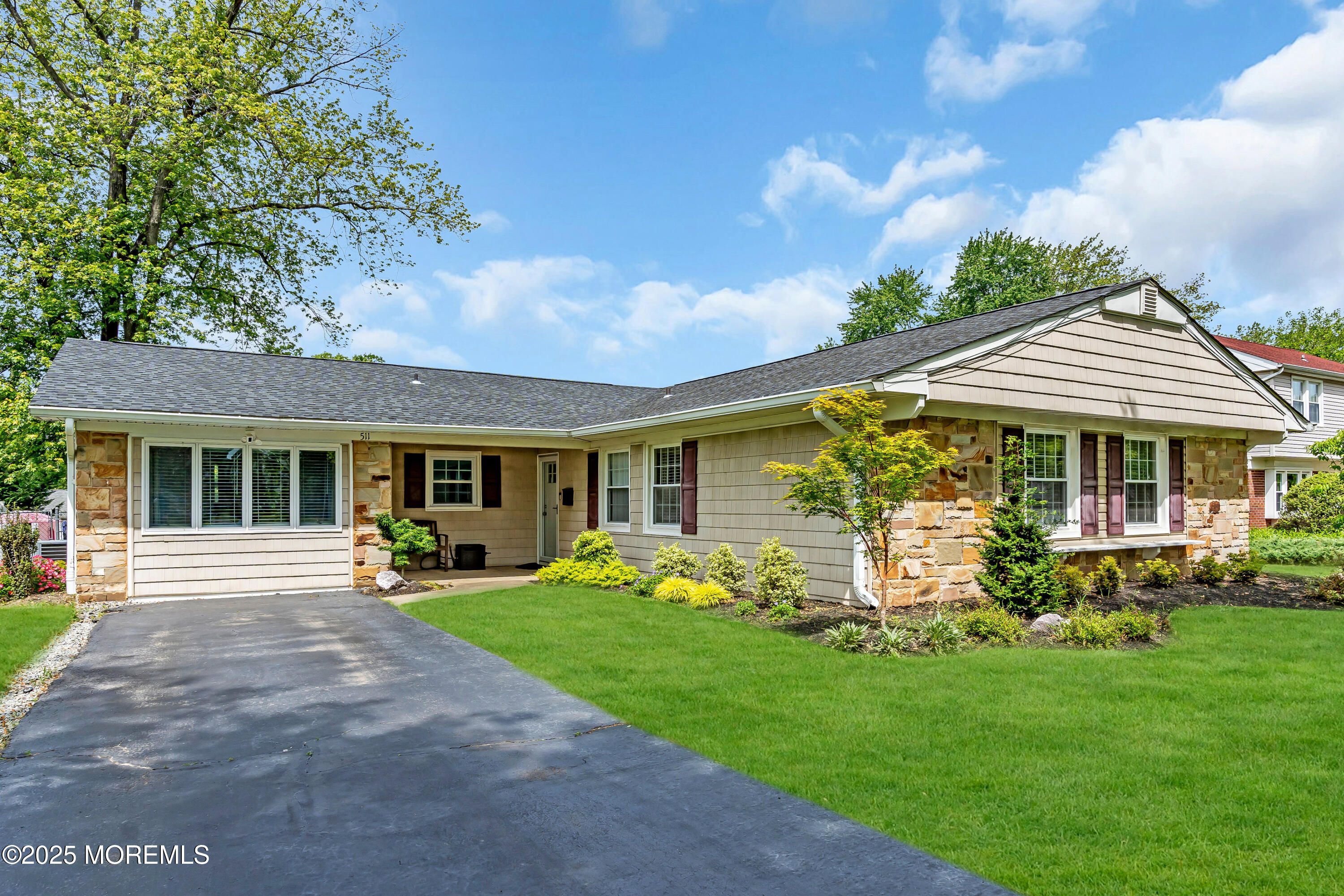 511 Line Road Aberdeen, NJ 07747 - Photo 3 of 53 a front view of a house with garden