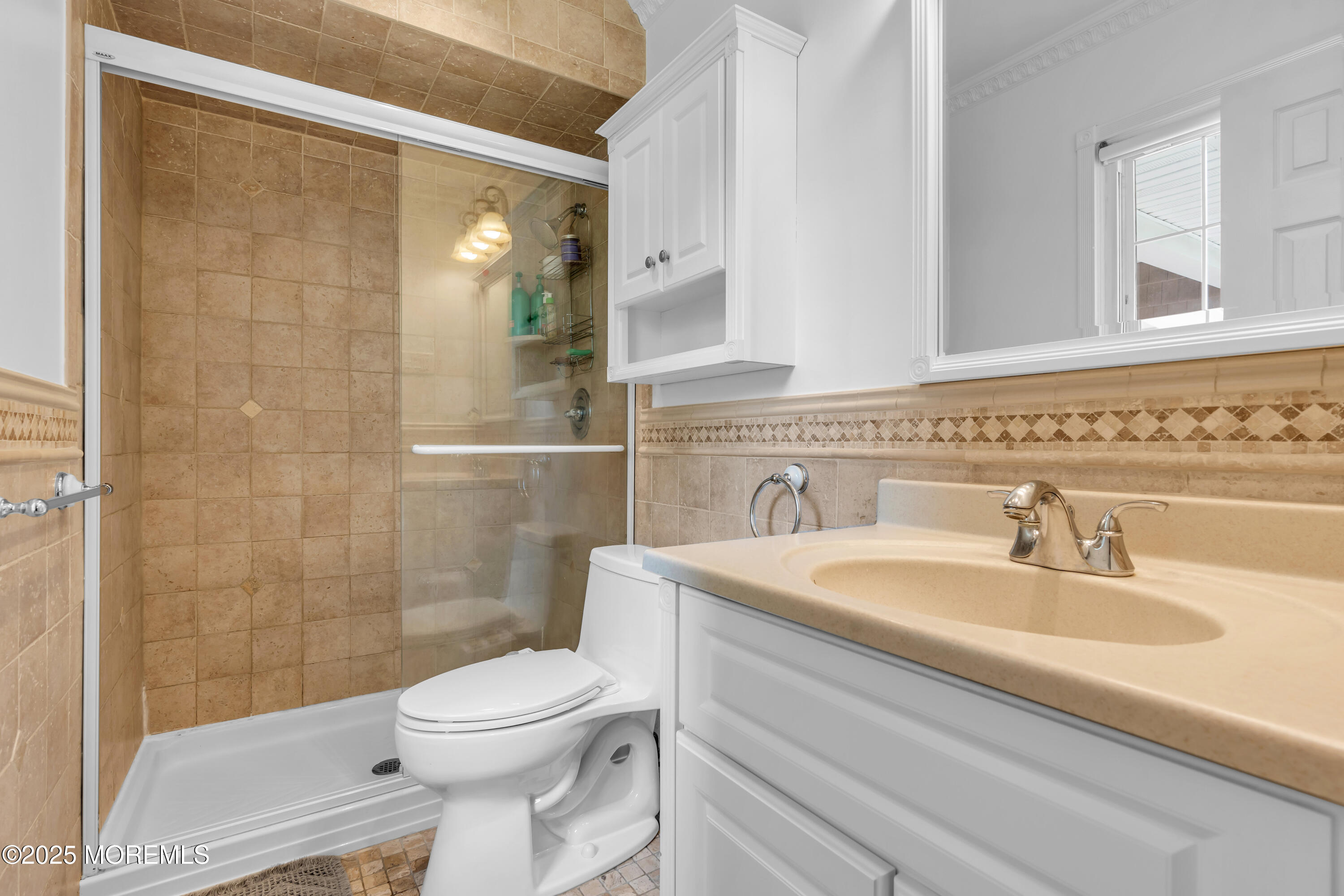 511 Line Road Aberdeen, NJ 07747 - Photo 33 of 53 a bathroom with a sink a toilet and shower