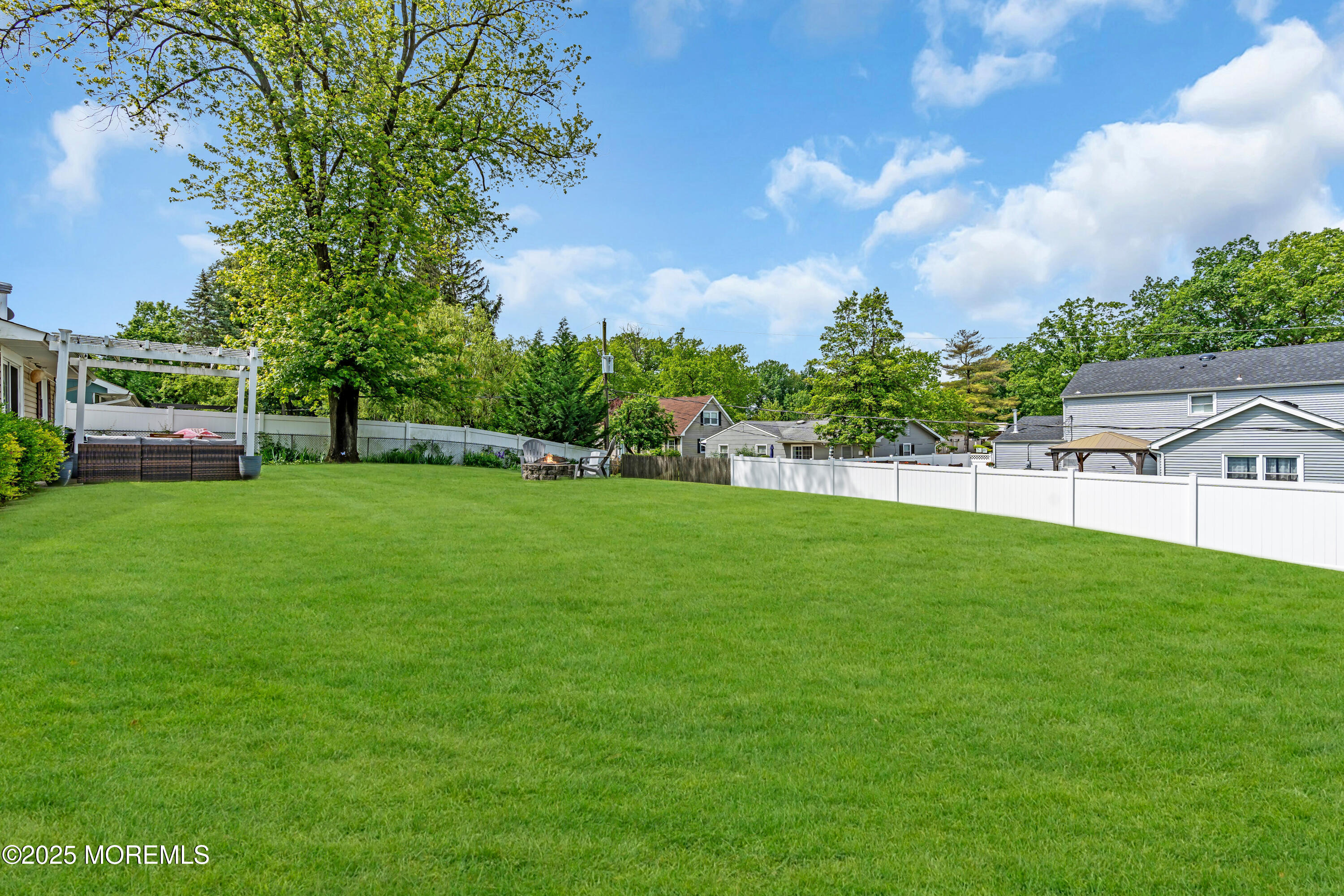 511 Line Road Aberdeen, NJ 07747 - Photo 41 of 53 a view of a field of grass and trees