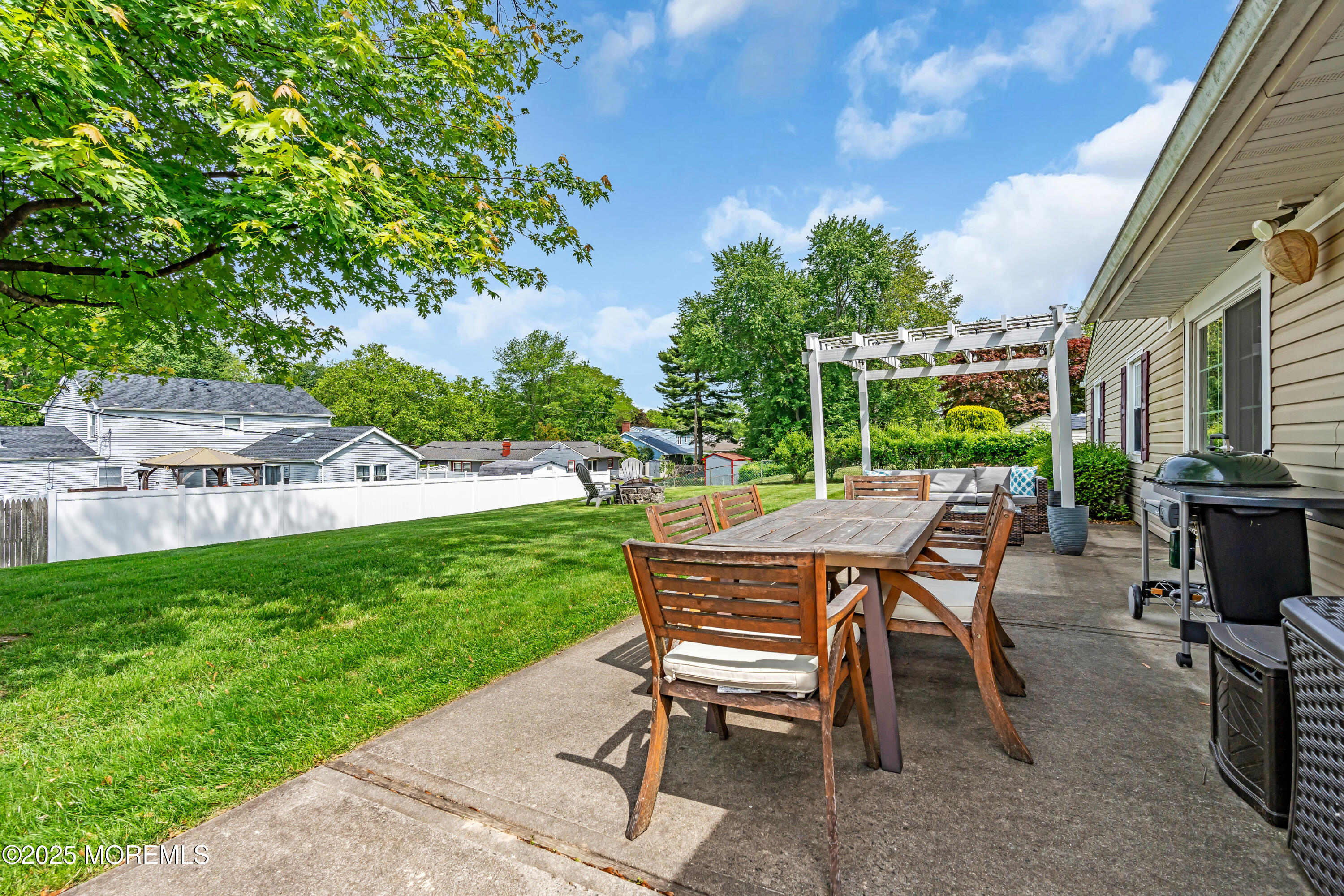 511 Line Road Aberdeen, NJ 07747 - Photo 44 of 53 a view of a patio with table and chairs and potted plants
